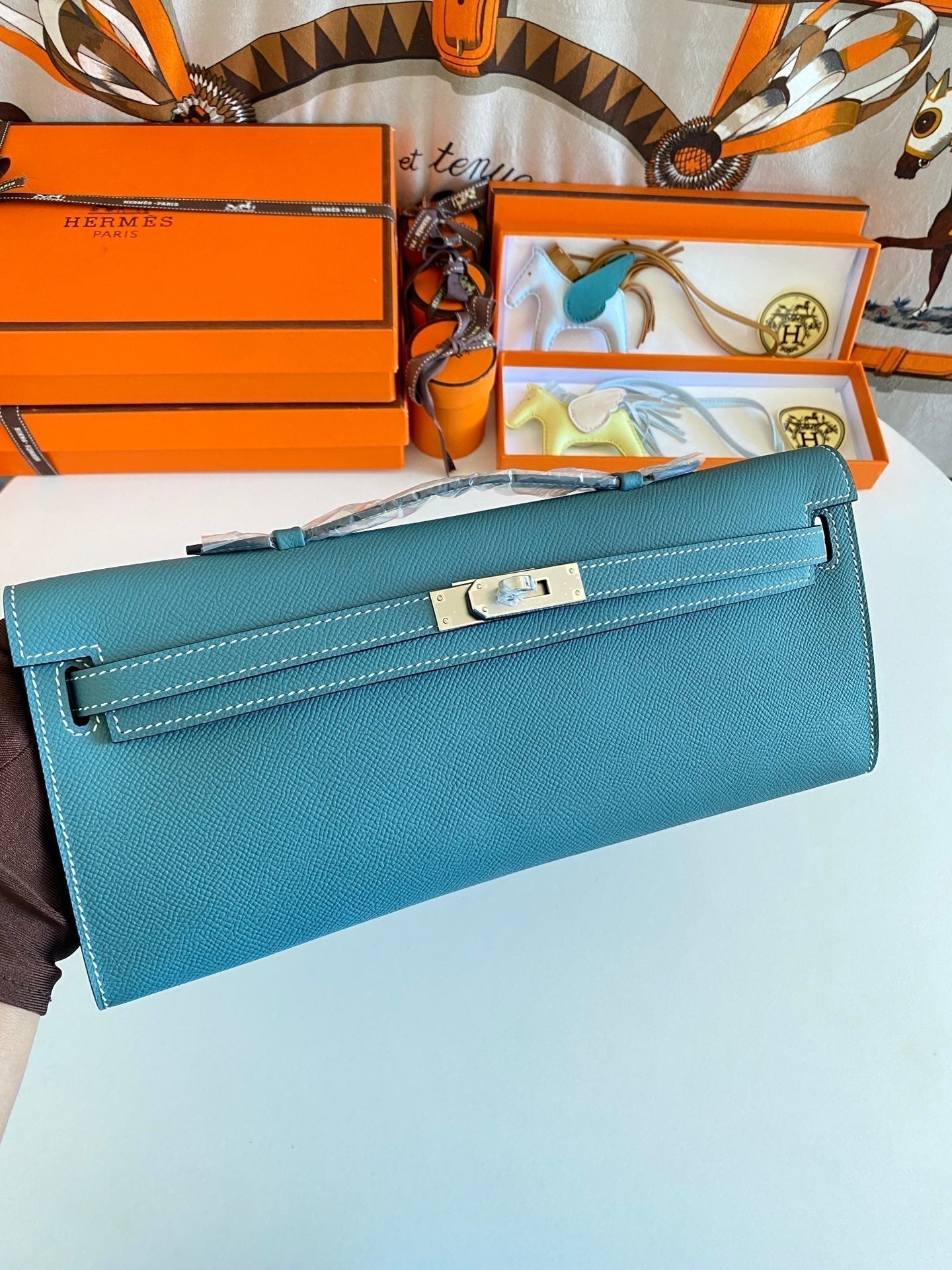 HERMES KELLY CUT 31 IN AZURE BLUE CALFSKIN WITH SILVER HARDWARE
