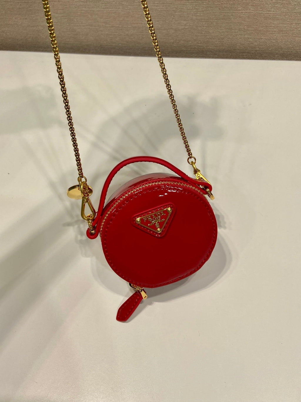 PRADA MINI ROUND BAG 8 IN RED GLOSSY CALFSKIN GOLD HARDWARE