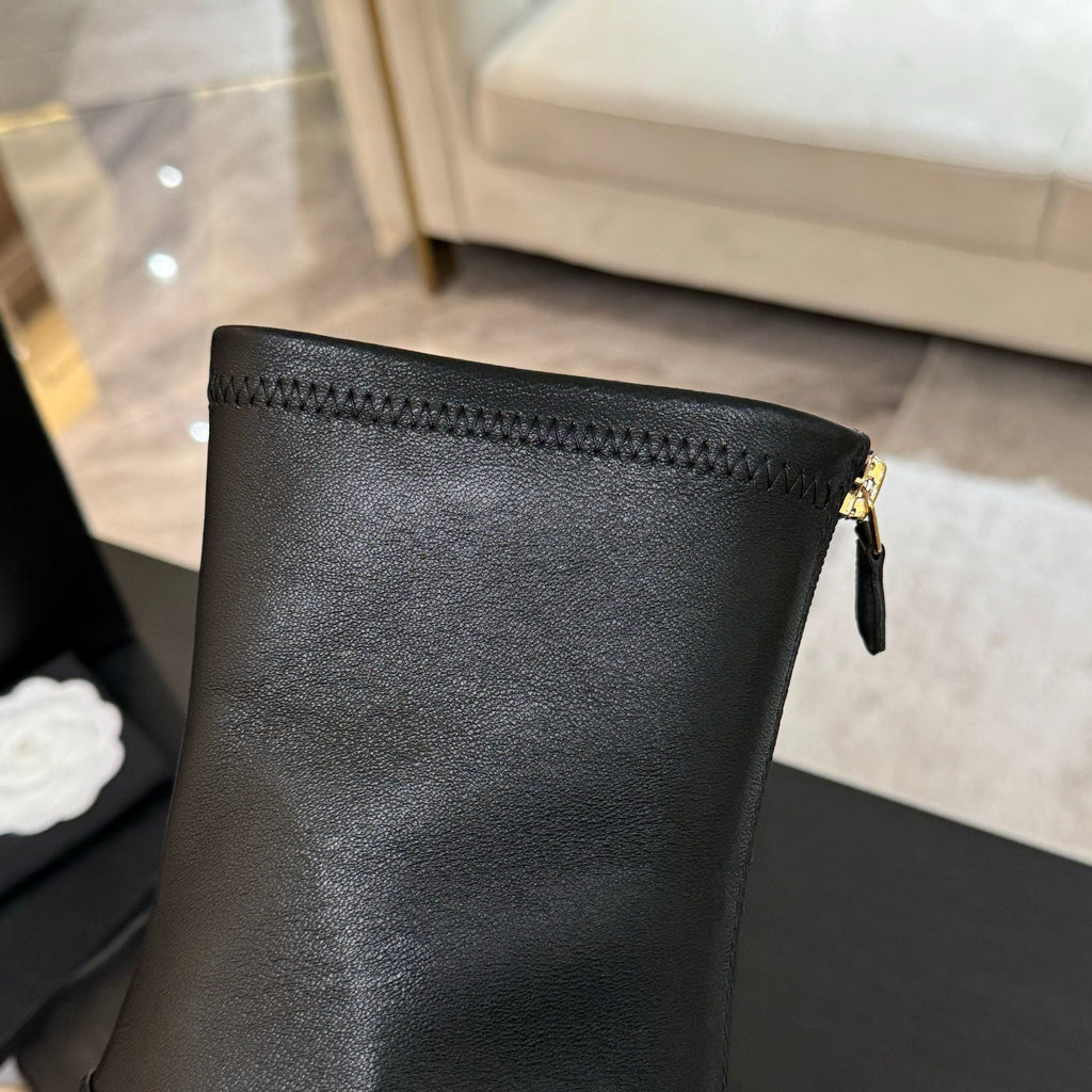CHANEL PEARL BOOTS 65MM IN BLACK CALFSKIN