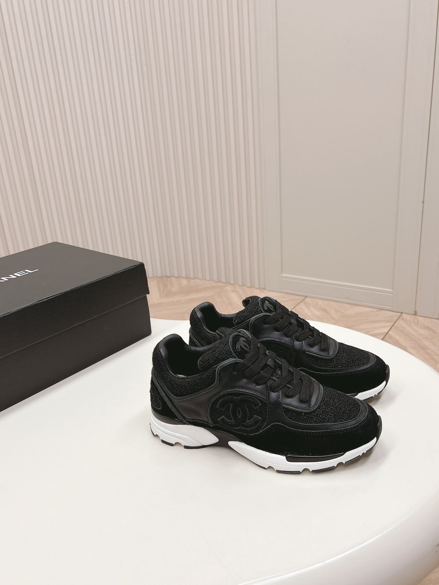 CHANEL TRAINERS IN BLACK SUEDE AND CALFSKIN