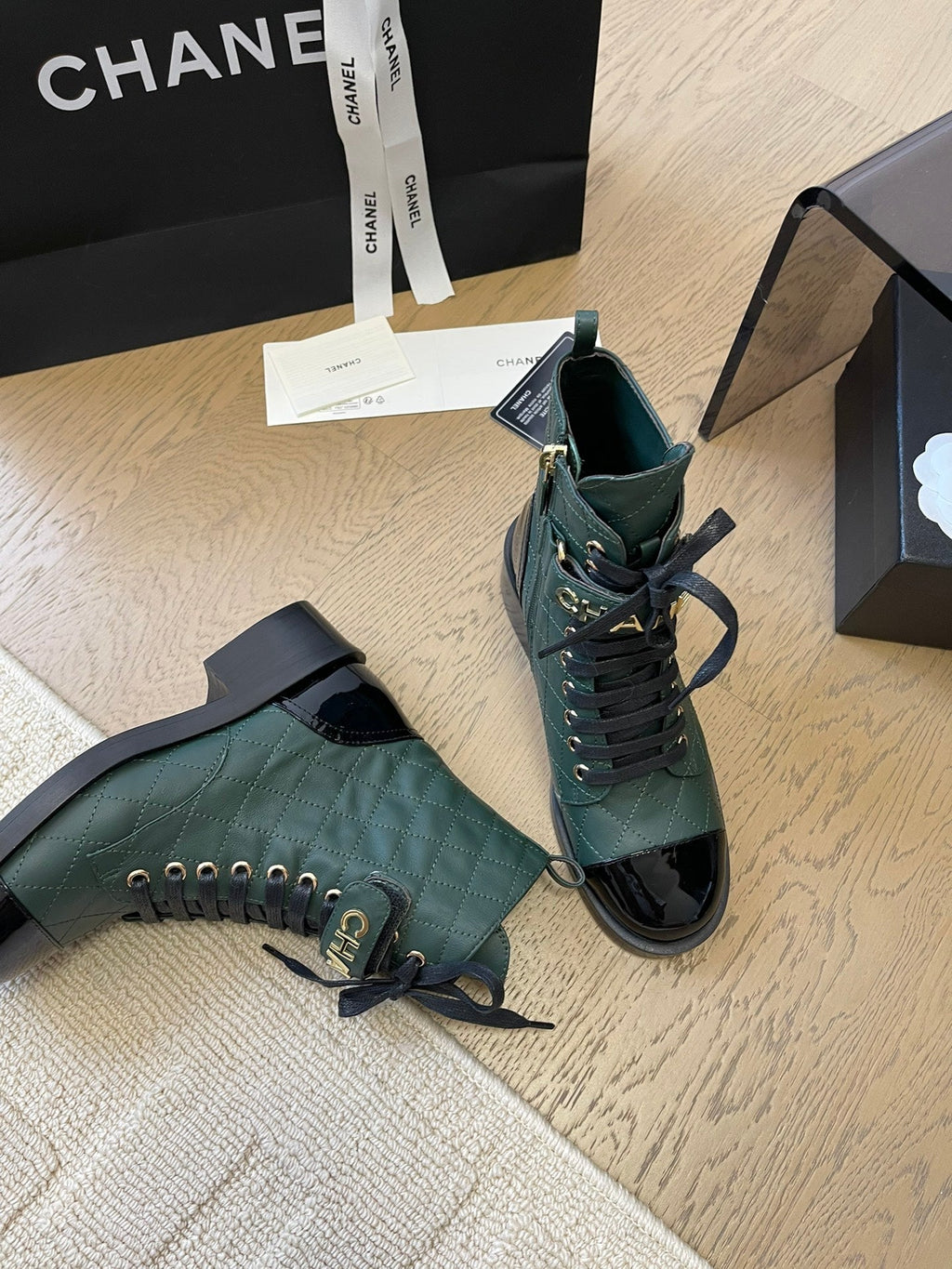 CHANEL ALPHABET MARTIN BOOTS IN FOREST GREEN LAMBSKIN