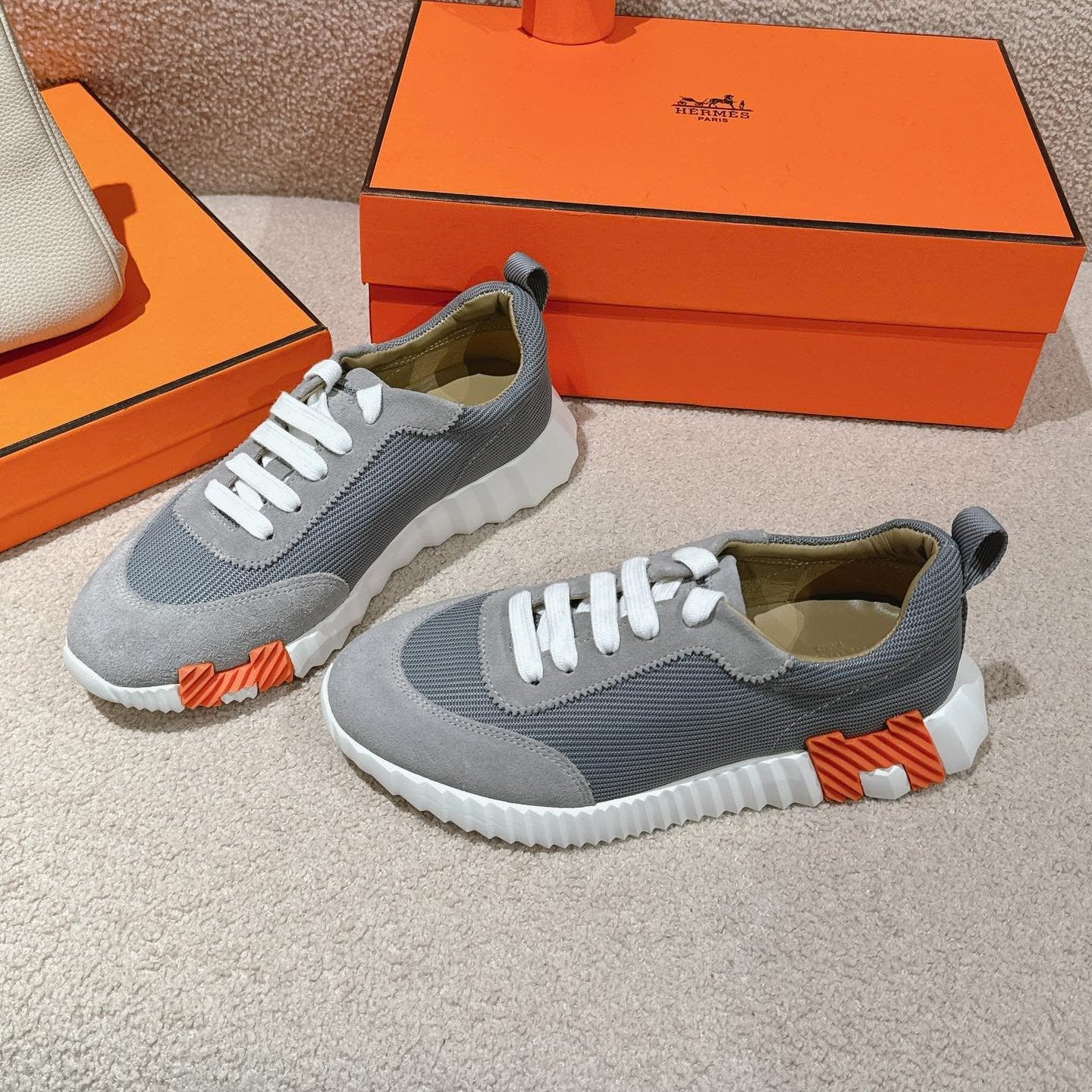 HERMES MAINLAND SNEAKER IN ASH GRAY SUEDE AND SHARK GRAY BREATHABLE MESH FABRIC